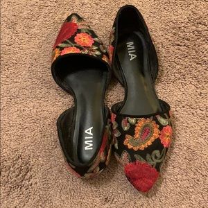 Black embroidered flats